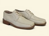 men ' s white leather shoes on a white background