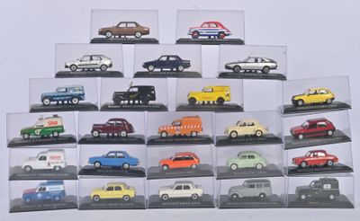 de nombreuses maquettes de voitures différentes dans une vitrine