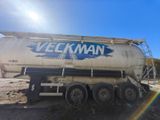 a truck that has a tank on the back of it