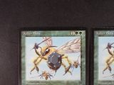 two cards with a picture of a bee and a bee with a camera