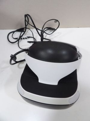a black and white object sitting on a white table