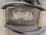 a close up of a metal device with wires attached to it