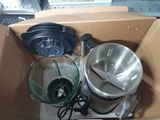 a box with a blender and a blender inside of it