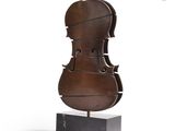 sculpture of a violin on a marble base on a white background