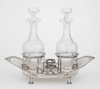 pair of cut glass decanters on a silver plate