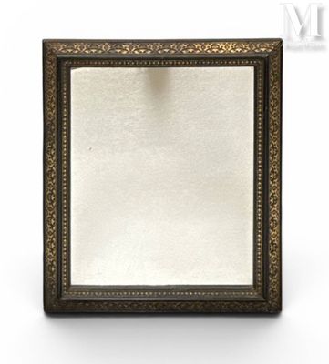 a close up of a mirror on a white surface with a white background