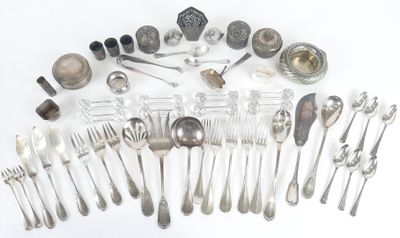 a lot of spoons and silverware on the table