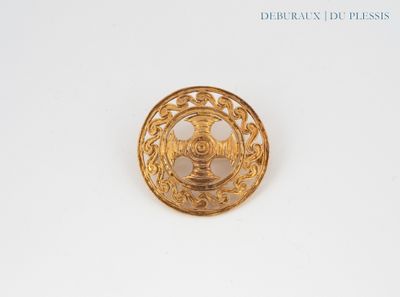 une image représentant une bague en or ornée d'un motif