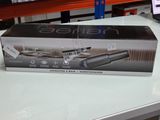 packaging of a hair dryer sitting on a table in a store