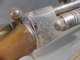 a close up of a gun on display on a table