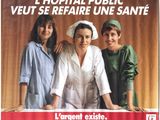 three women standing next to each other in front of a poster