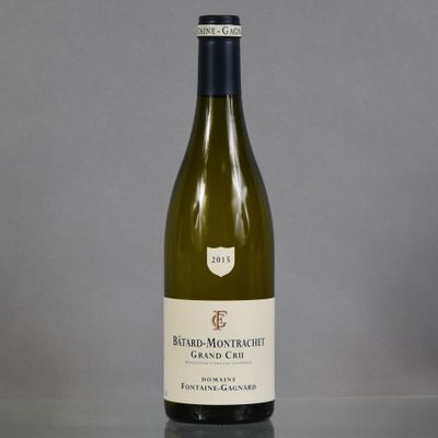 a bottle of wine that is sitting on a table