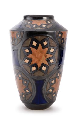 a blue vase with a design on it on a white background