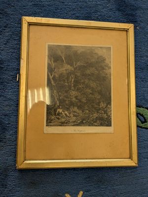 a picture of a picture of a forest in a gold frame