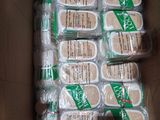 a cardboard box filled with lots of food items