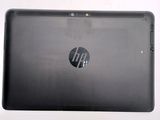 the back view of a laptop with a small screen on it