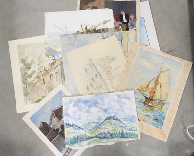 a lot of paintings on the floor next to a pair of scissors