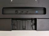 a close up of a laptop with a power strip attached to it