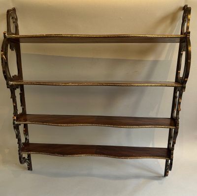 a wooden shelf with three shelves on each side and two shelves on the other side