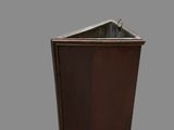 a small trash can with a lid on a gray surface
