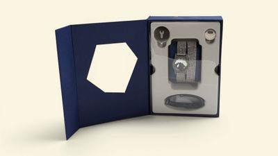 a blue box with a watch inside of it