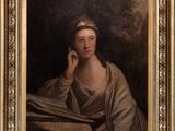 portrait of a woman reading a book in a gold frame