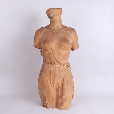statue of a woman in a brown dress on a white background