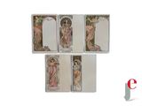 a group of four cards with different designs on them
