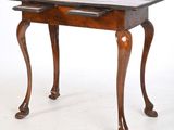 an image of a wooden table with a drawer on it