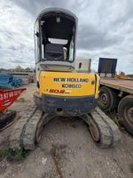 🚜 MINI-PELLE NEW HOLLAND 50.2 SR + 2 godets (photo 3)