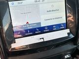 a picture of a car dashboard with a navigation system