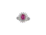 an oval ruby and diamond ring