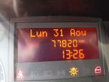 a digital display on the dashboard of a car