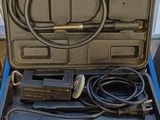 a tool box with tools in it sitting on the floor