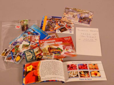 a lot of books and postcards on the table