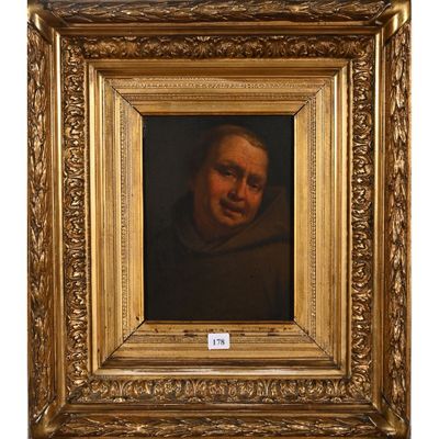 un tableau représentant un vieil homme, dans un cadre doré