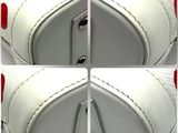 four pictures of a white purse with red spots on it
