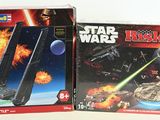 two boxes of star wars electronic toys on the table