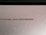 a close up of a silver laptop with a black keyboard