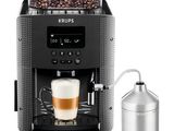 La machine à café Krups se trouve à côté d'une tasse de café