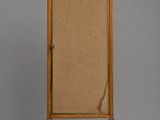 an old wooden easer with a burlock canvas on it