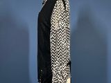 a black and white jacket on a mannequin mannequin mannequin mannequin mannequin mannequin mannequin mannequin mann