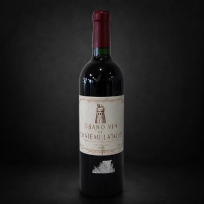 a bottle of wine that is sitting on a table