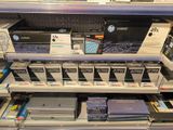 a lot of electronics on the shelves in the store