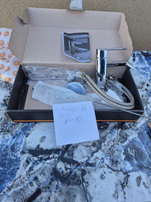 Mitigeur lavabo Zazzeri Tango, coloris chrome, avec flexible…