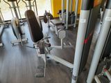 an image of a gym room with equipment in it