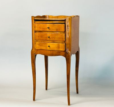an old wooden chest of drawers with a drawer on one side and a drawer on the other