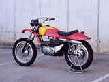 a red and yellow motorcycle parked in a parking lot