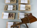 several old photos of a wooden plane and a bunch of money