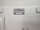 a close up of the back panel of a laptop